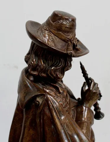 Pendule en Bronze et Marbre « Le Joueur de Flûte », de C-A. Calmels – 2ème partie XIXe