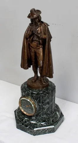 Pendule en Bronze et Marbre « Le Joueur de Flûte », de C-A. Calmels – 2ème partie XIXe