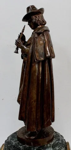 Pendule en Bronze et Marbre « Le Joueur de Flûte », de C-A. Calmels – 2ème partie XIXe