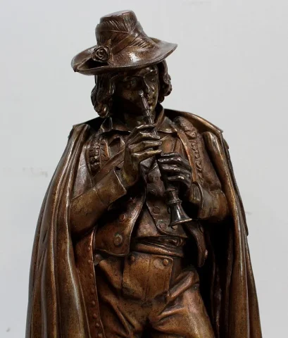 Pendule en Bronze et Marbre « Le Joueur de Flûte », de C-A. Calmels – 2ème partie XIXe