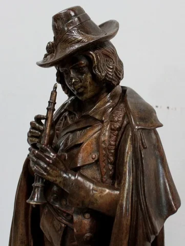 Pendule en Bronze et Marbre « Le Joueur de Flûte », de C-A. Calmels – 2ème partie XIXe