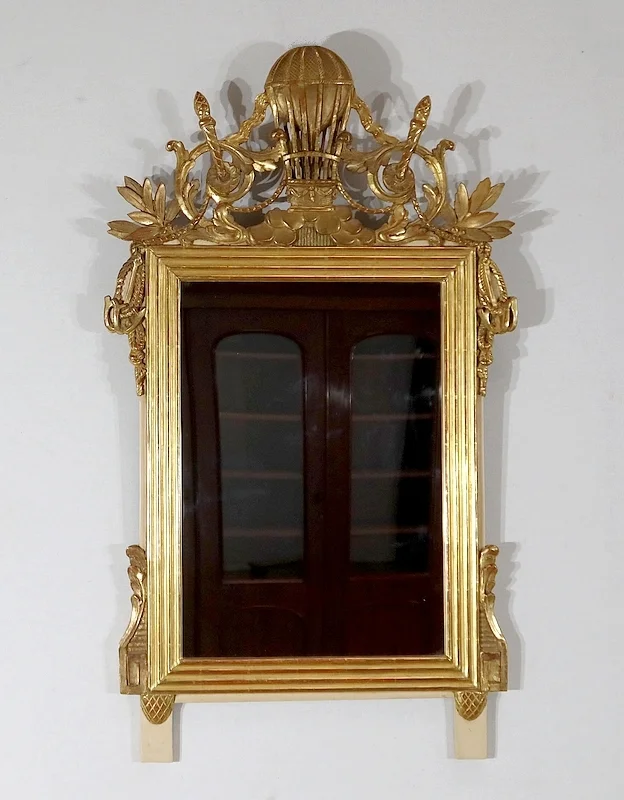 Miroir en bois doré à la feuille d'Or Louis XVI – 2ème partie XIXe