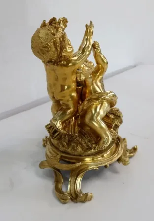 VERGOLDETE BRONZE-GRUPPE