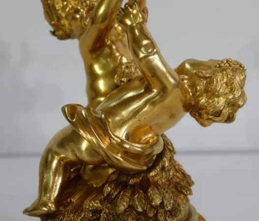 VERGOLDETE BRONZE-GRUPPE