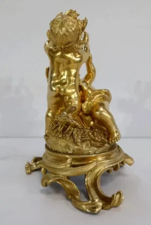 VERGOLDETE BRONZE-GRUPPE