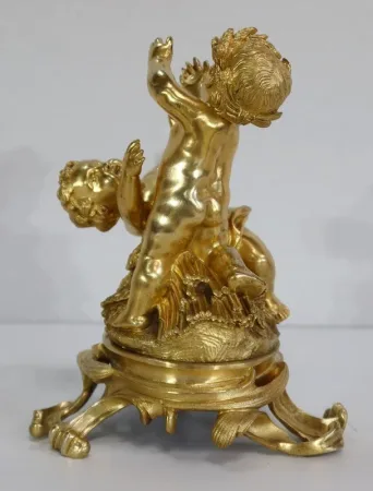 VERGOLDETE BRONZE-GRUPPE
