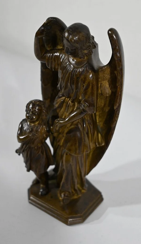 Bronze Patiné, « Enfant conduit par un Ange » – 1900