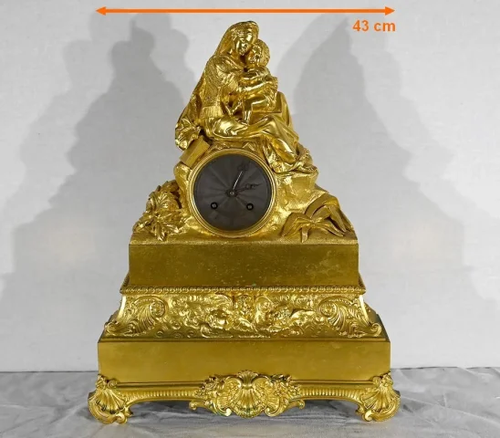 Pendule en Bronze Doré « La Vierge à la Chaise » – 1ère partie XIXe