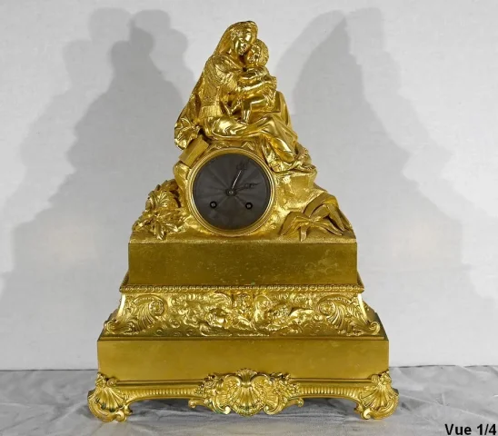 Pendule en Bronze Doré « La Vierge à la Chaise » – 1ère partie XIXe