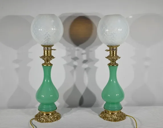 PAIR OF OPALINE AND BRONZE LAMPS