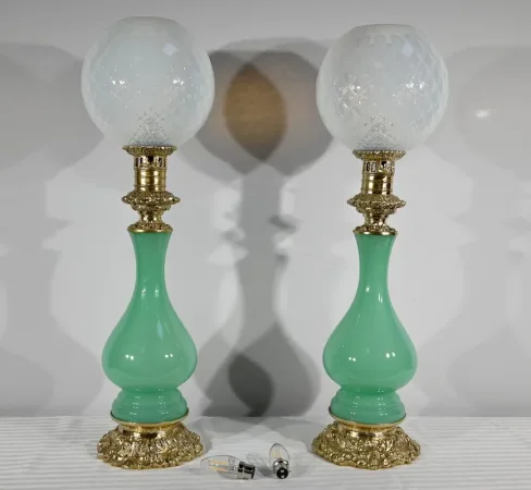 PAIR OF OPALINE AND BRONZE LAMPS