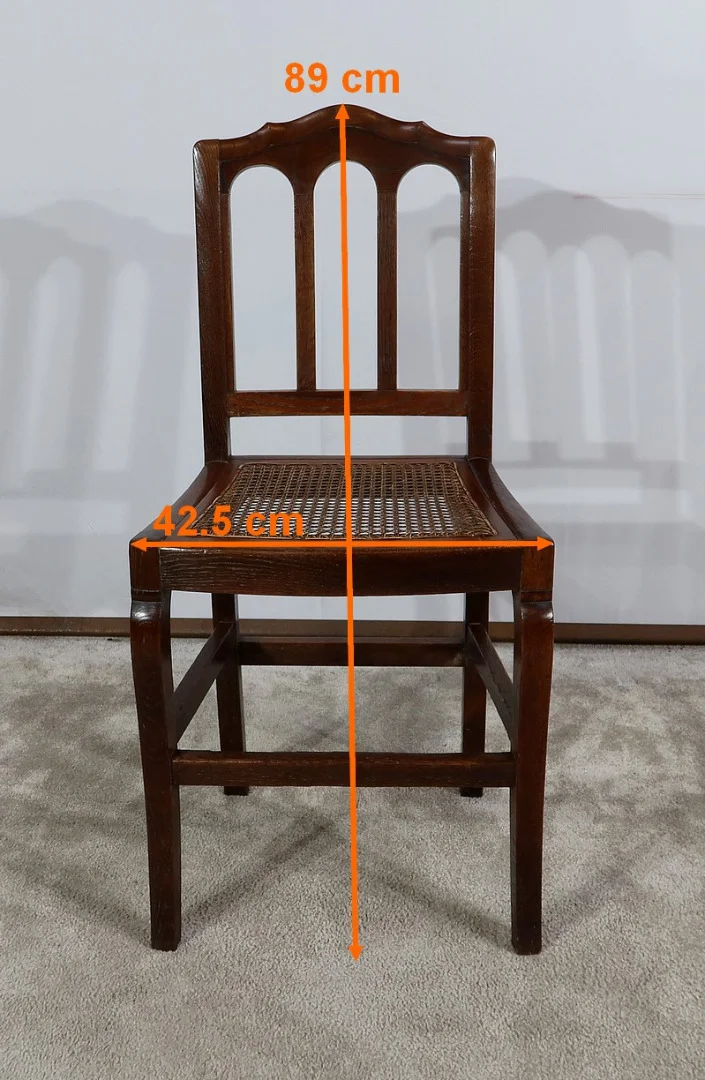 Suite de 4 chaises en chêne massif – 2ème moitié XIXe