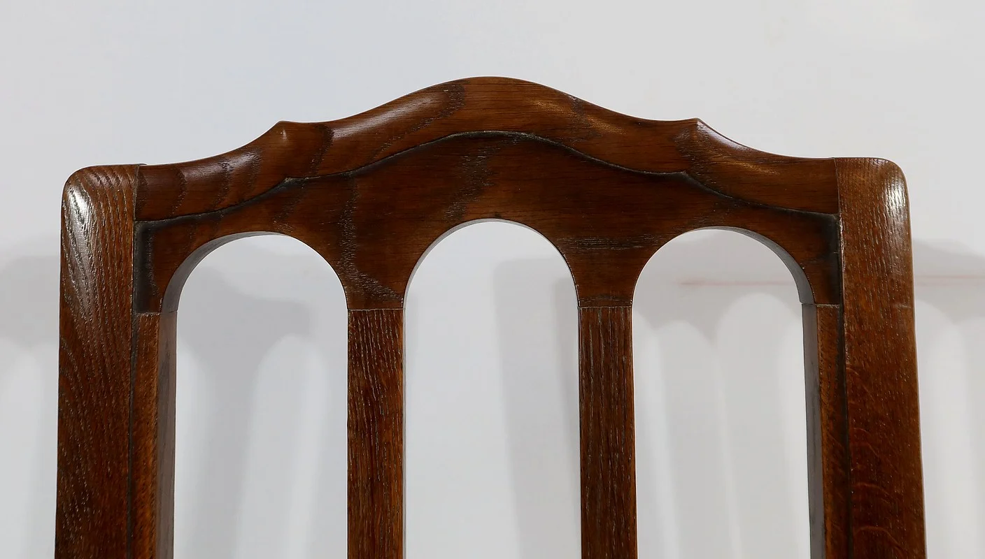 Suite de 4 chaises en chêne massif – 2ème moitié XIXe