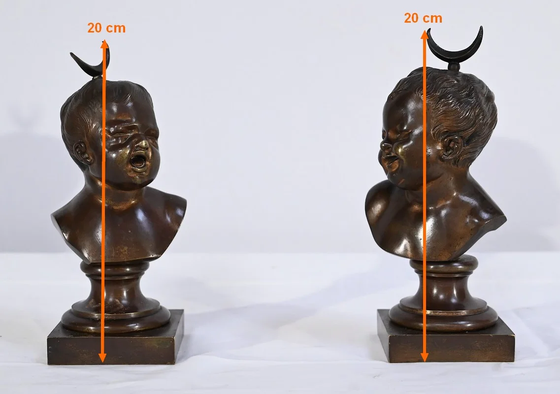 PAREJA DE BUSTOS DE BRONCE
