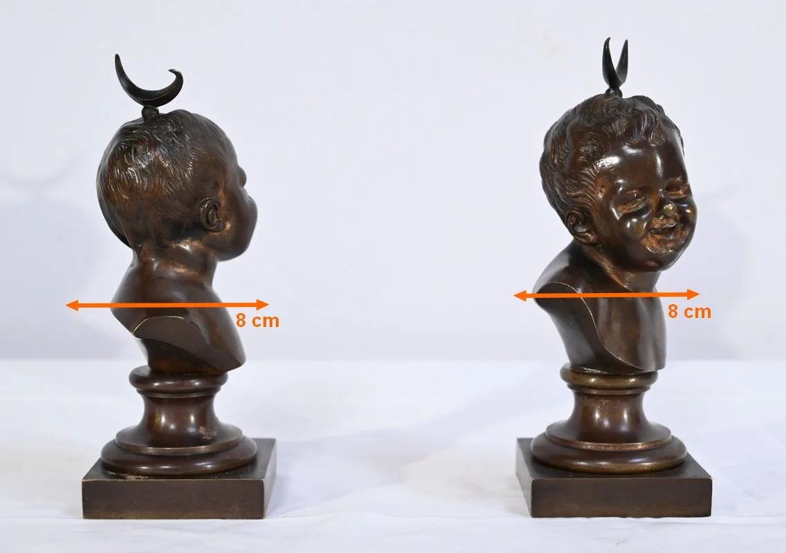 PAREJA DE BUSTOS DE BRONCE