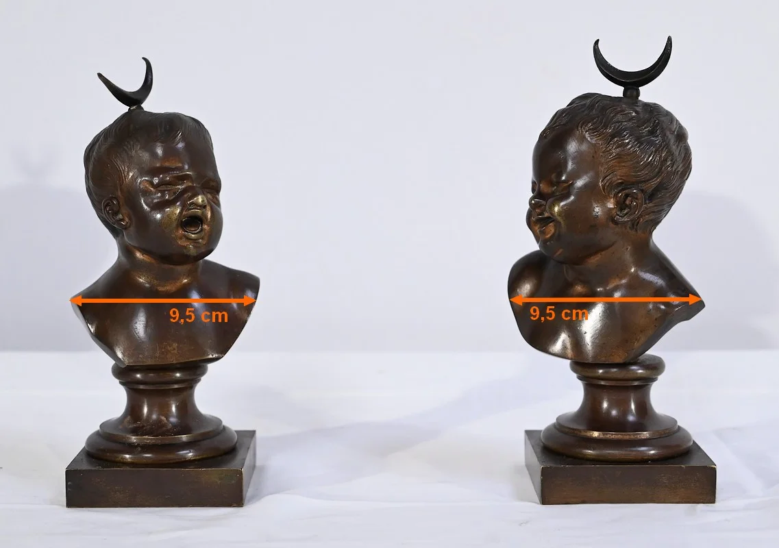 PAREJA DE BUSTOS DE BRONCE