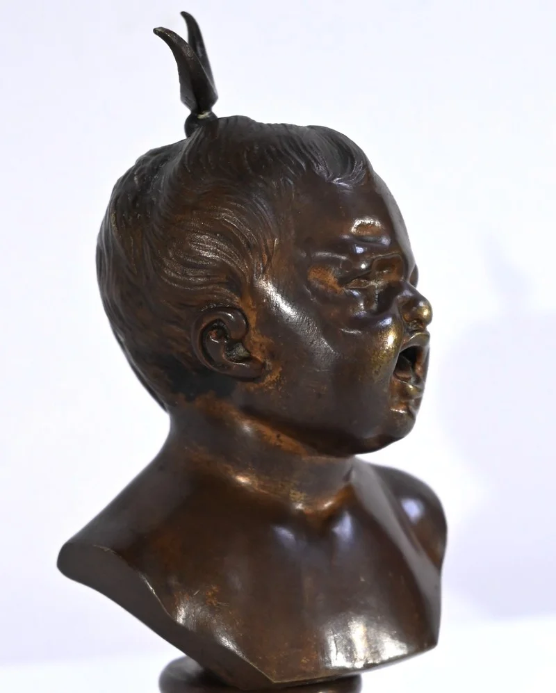 PAREJA DE BUSTOS DE BRONCE