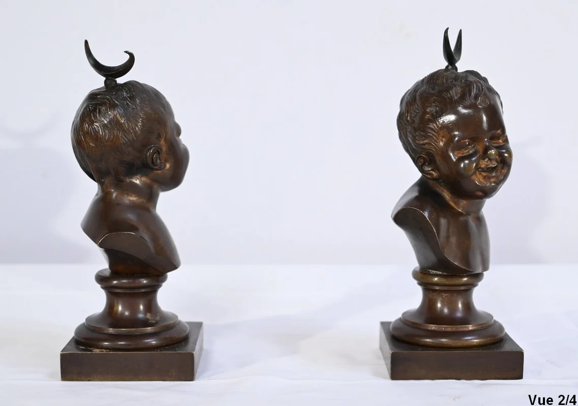 PAREJA DE BUSTOS DE BRONCE