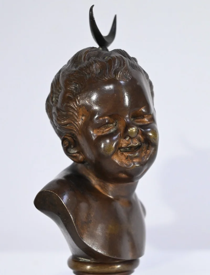 PAREJA DE BUSTOS DE BRONCE