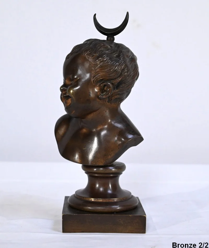 PAREJA DE BUSTOS DE BRONCE