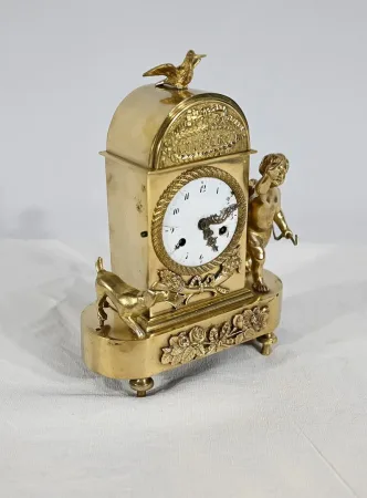 Petite Pendulette de Voyage en Bronze Doré,  époque Empire -  Début XIXe