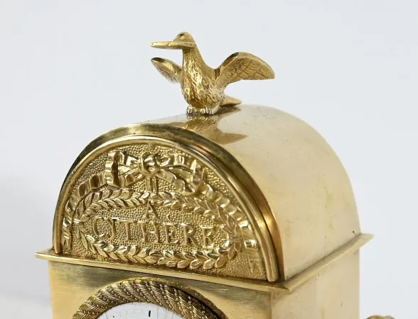 Petite Pendulette de Voyage en Bronze Doré,  époque Empire -  Début XIXe