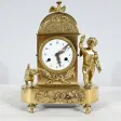 Petite Pendulette de Voyage en Bronze Doré,  époque Empire -  Début XIXe