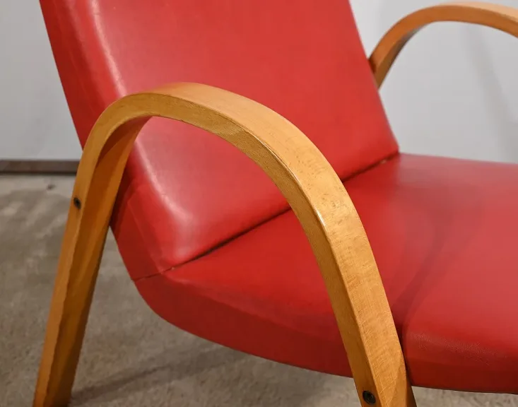 Fauteuil Bow Wood par Hugues Steiner – 1950