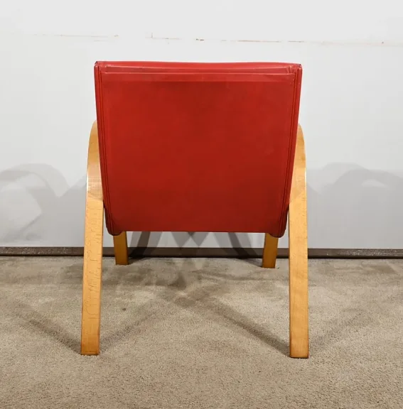 Fauteuil Bow Wood par Hugues Steiner – 1950
