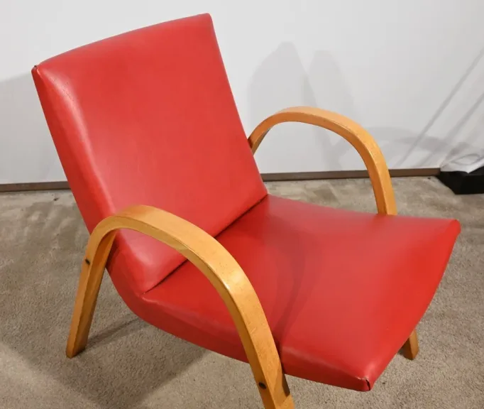 Fauteuil Bow Wood par Hugues Steiner – 1950