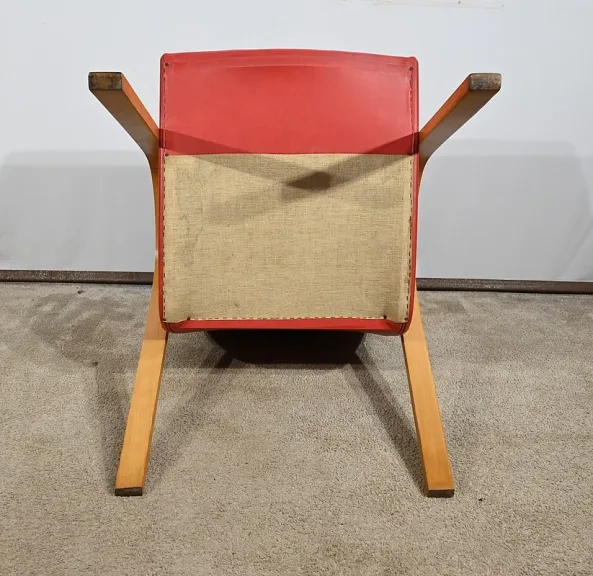 Fauteuil Bow Wood par Hugues Steiner – 1950
