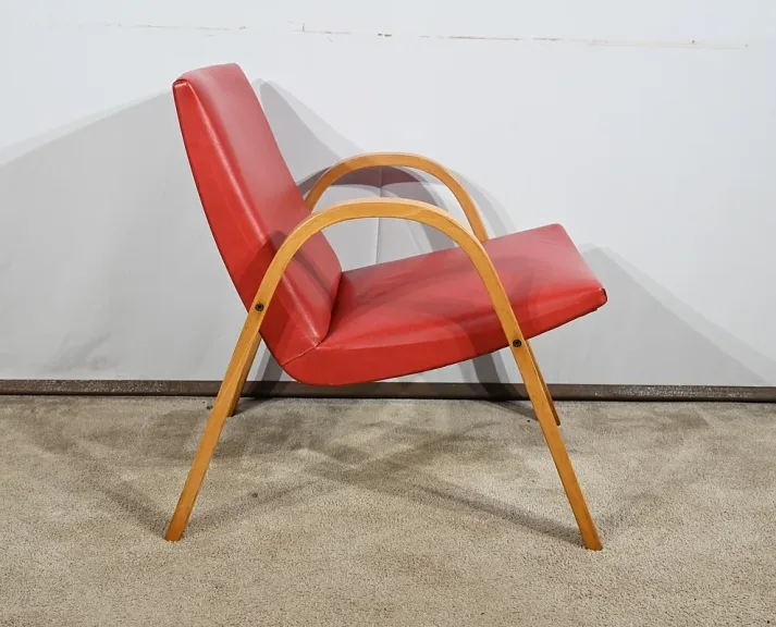 Fauteuil Bow Wood par Hugues Steiner – 1950
