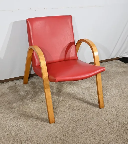 Fauteuil Bow Wood par Hugues Steiner – 1950