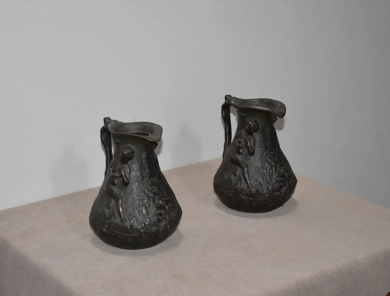 PAIR OF PEWTER VASEES