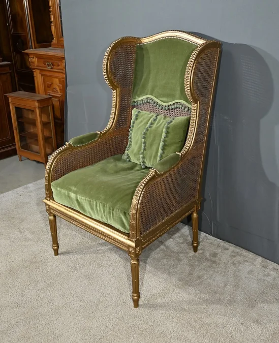 Importante Bergère en Bois Doré et à Oreilles Cannées, style Louis XVI – 1900