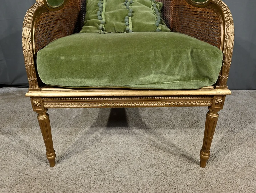 Importante Bergère en Bois Doré et à Oreilles Cannées, style Louis XVI – 1900