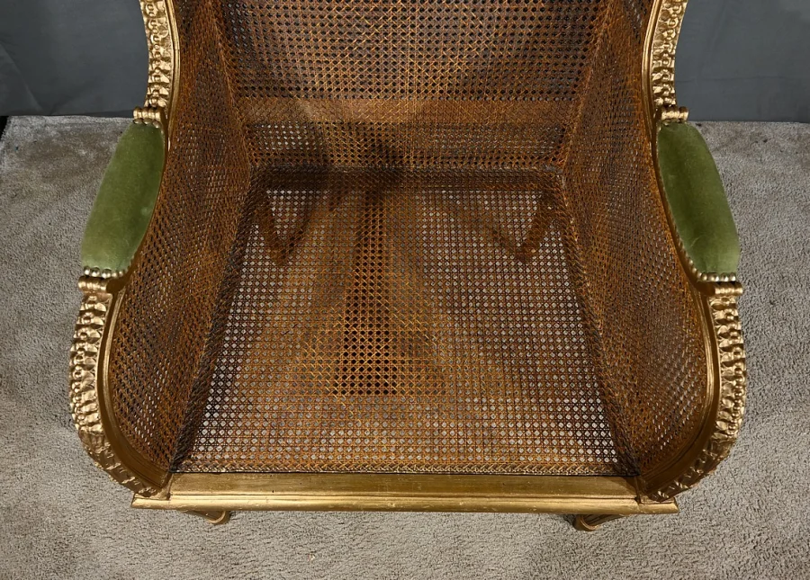 Importante Bergère en Bois Doré et à Oreilles Cannées, style Louis XVI – 1900