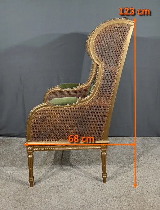 Importante Bergère en Bois Doré et à Oreilles Cannées, style Louis XVI – 1900