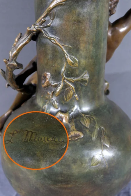 PAIR OF SPELTER VASES signed L. MOREAU