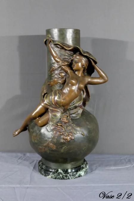 PAIR OF SPELTER VASES signed L. MOREAU