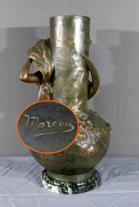 PAIR OF SPELTER VASES signed L. MOREAU