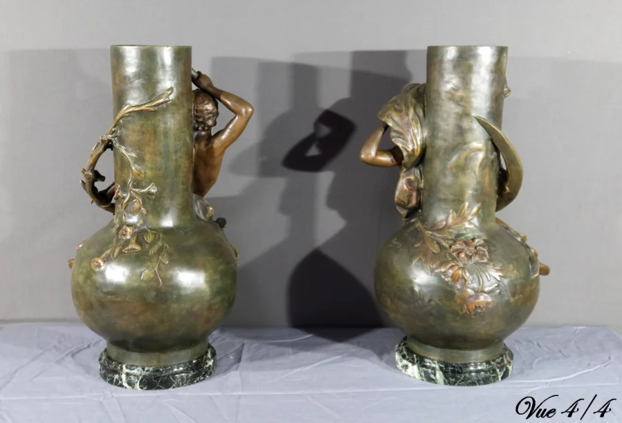 PAIR OF SPELTER VASES signed L. MOREAU