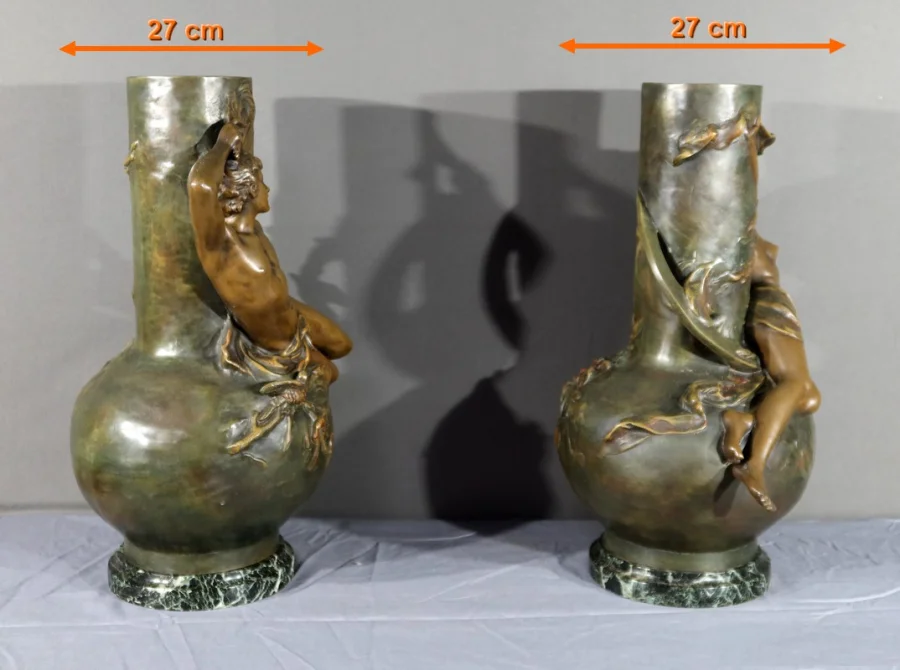 PAIR OF SPELTER VASES signed L. MOREAU