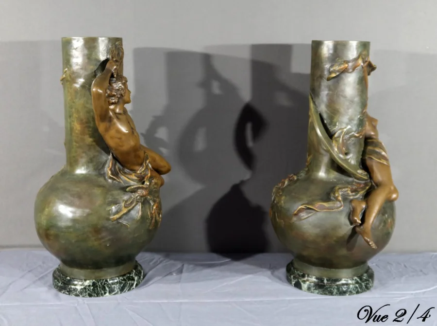 PAIR OF SPELTER VASES signed L. MOREAU