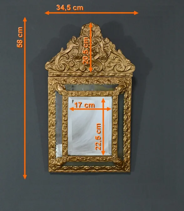 MIRROR IN REPOUSSE BRASS