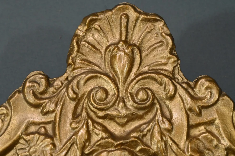 MIRROR IN REPOUSSE BRASS