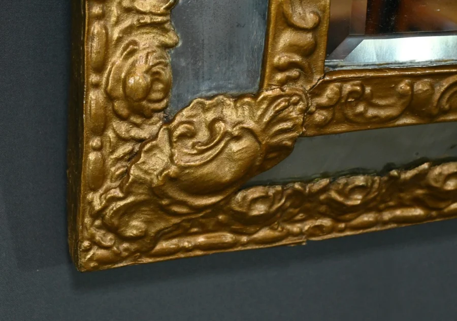 MIRROR IN REPOUSSE BRASS