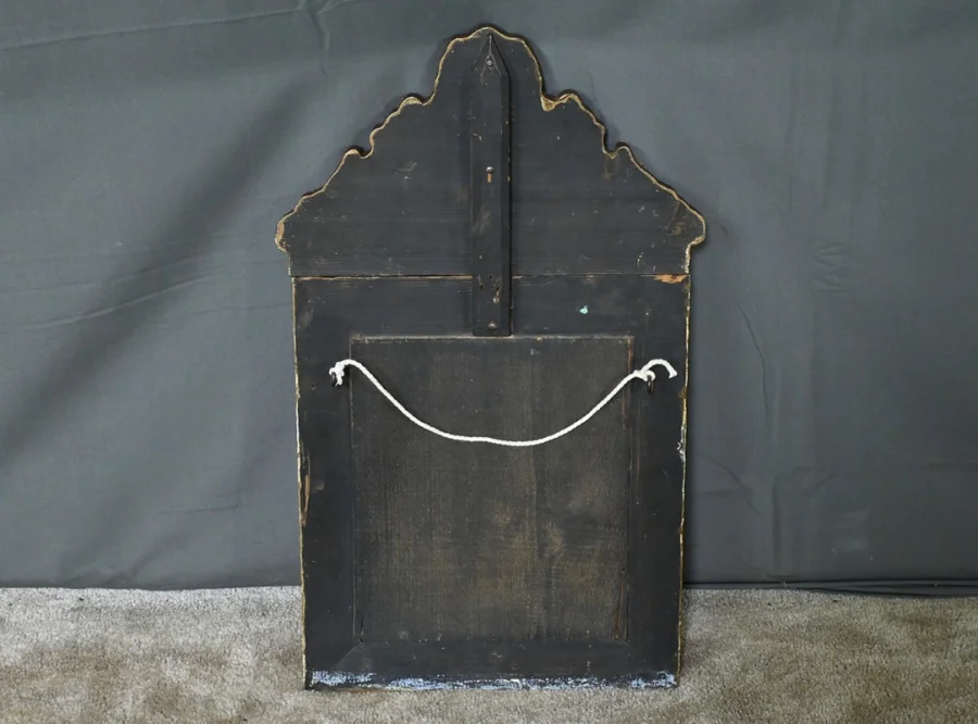 MIRROR IN REPOUSSE BRASS