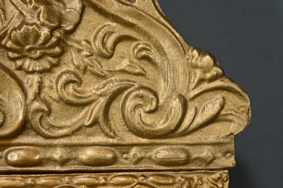 MIRROR IN REPOUSSE BRASS