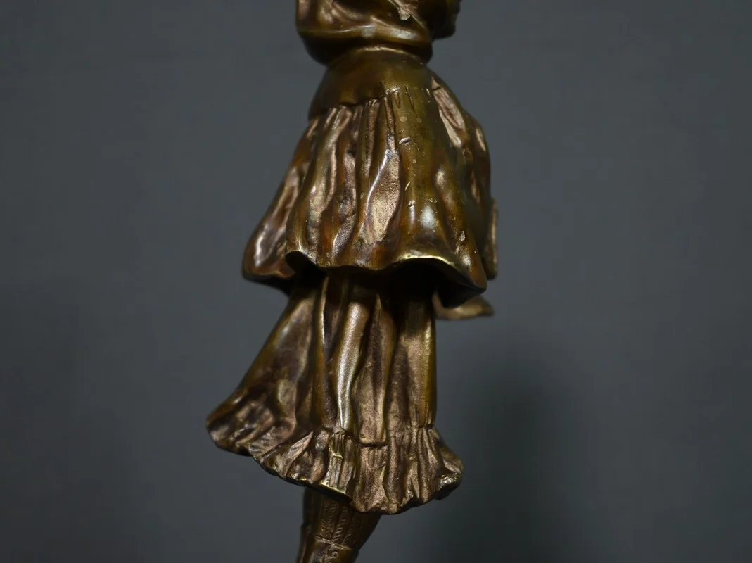 Bronze « L’Ecolière », signé Tremo – Début XXe